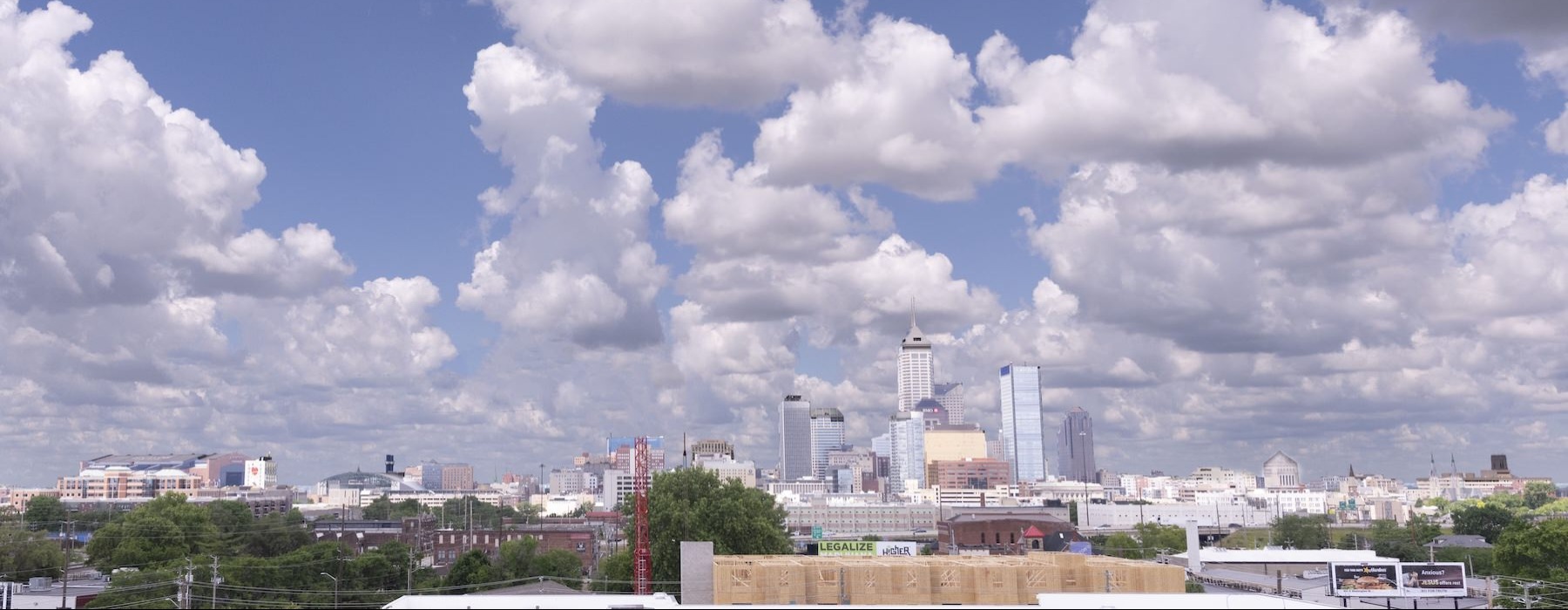 a city skyline with clouds