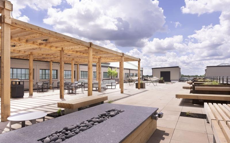 a fire pit and an outdoor lounge area